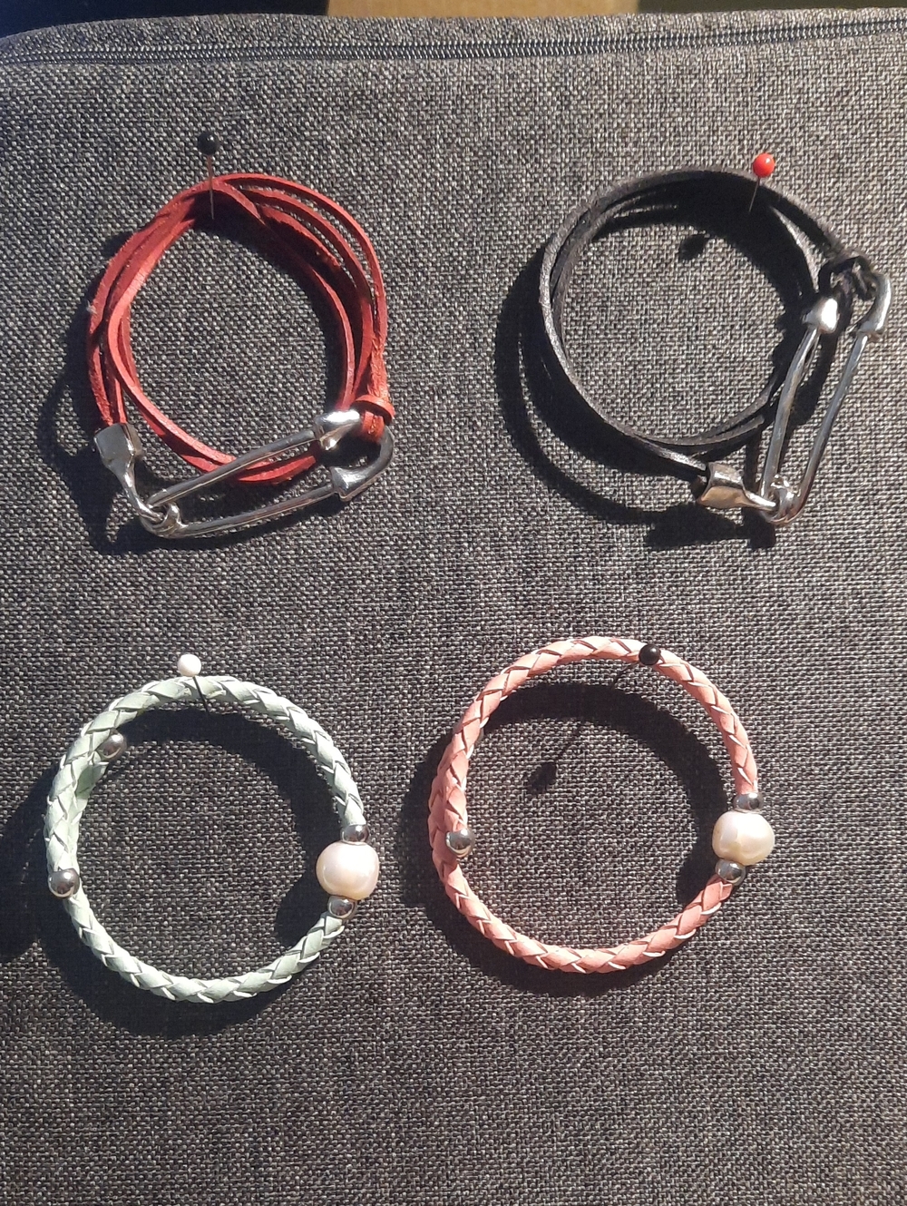 Set of Four Leather Wrap Bracelets in Red, Black, Mint, and Pink